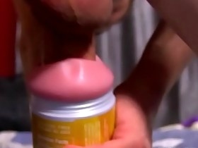 Handsome twink Phillip fucks a fleshlight with a huge cock
